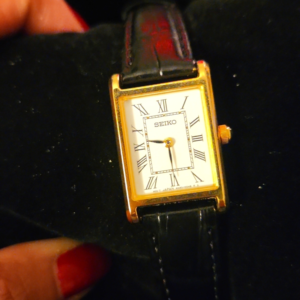 Women's Seiko black leather band watch  with gold detailing